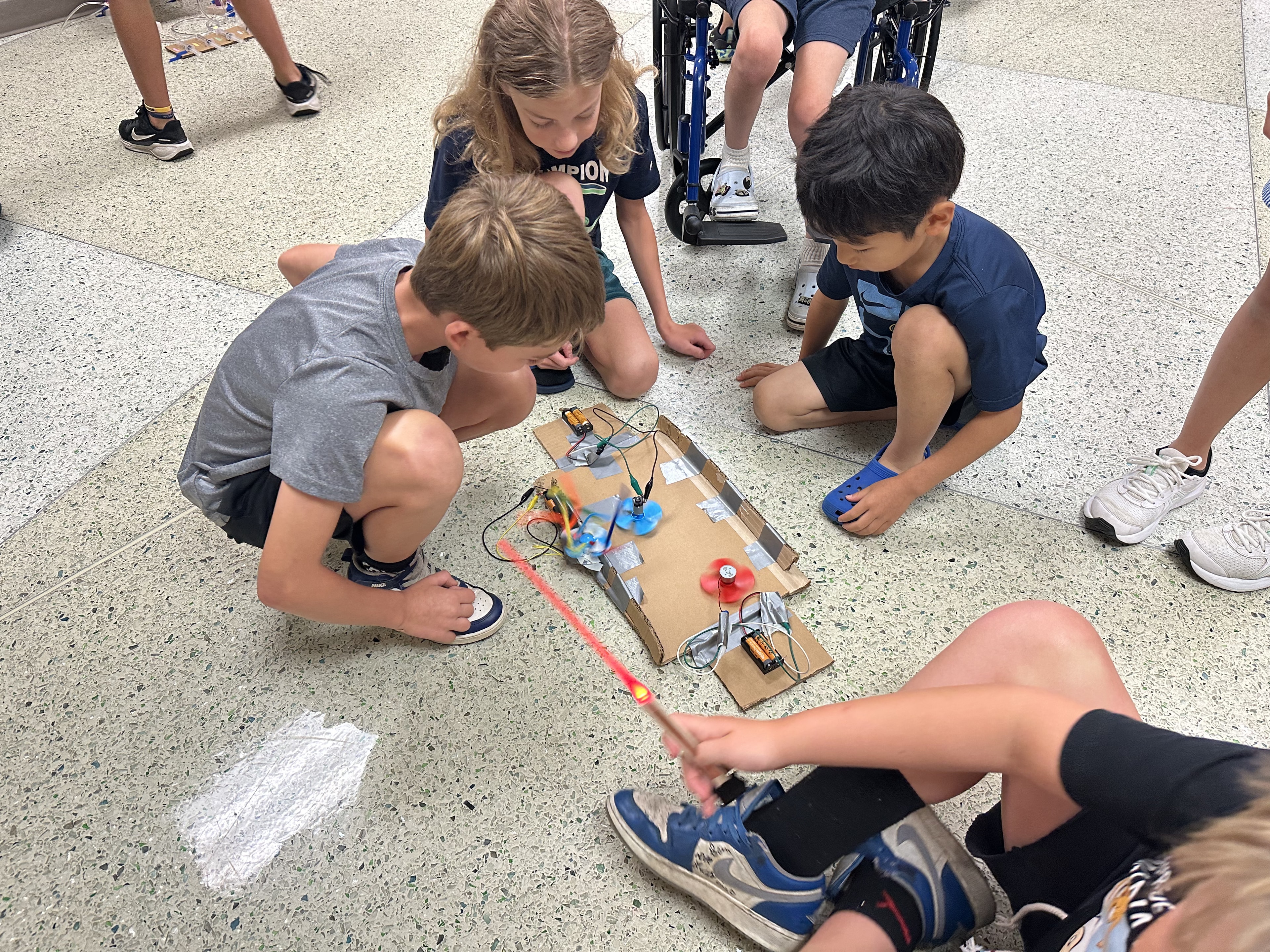 Students participating in a robotics activity