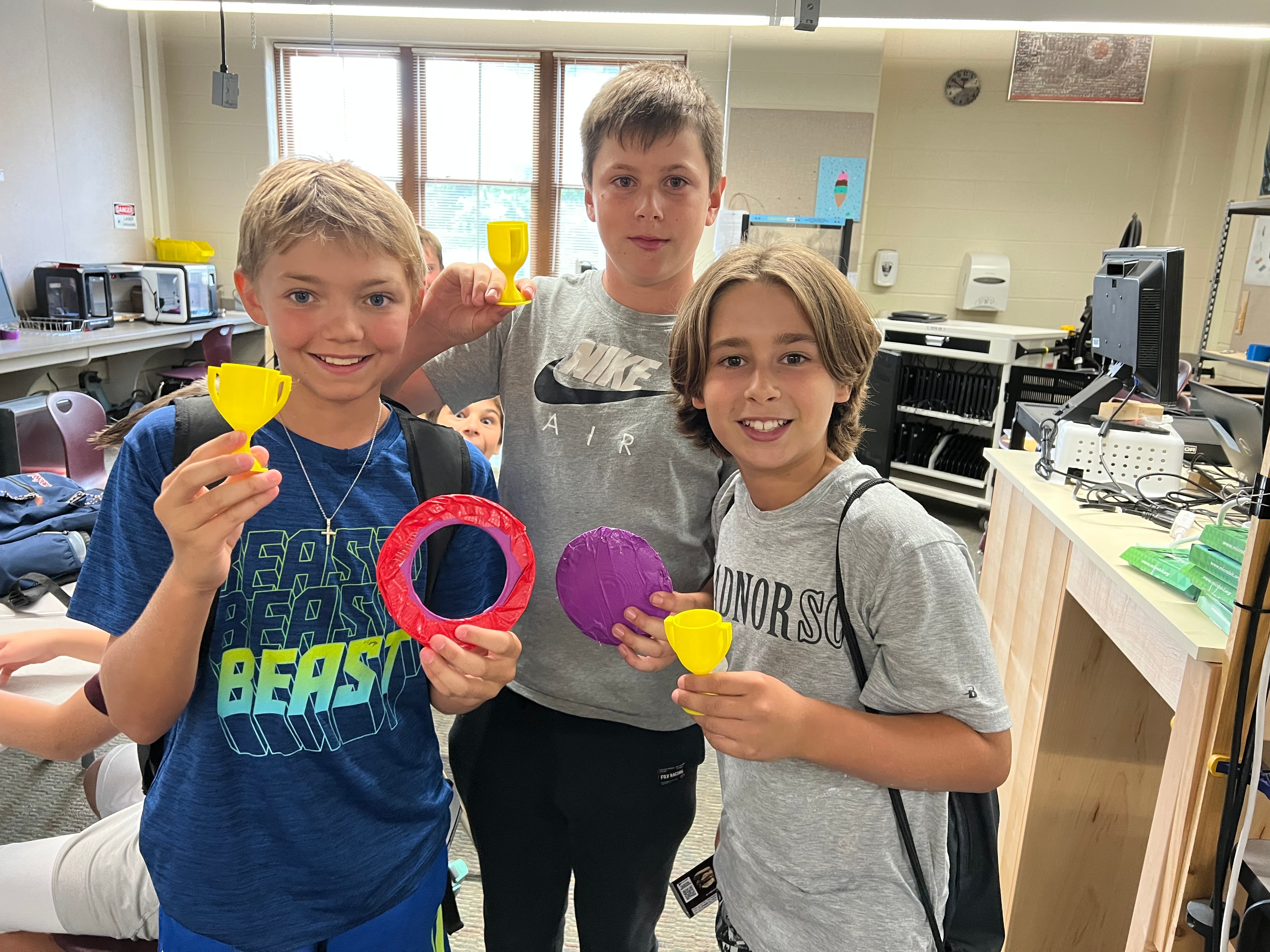 Students showing their finished creations